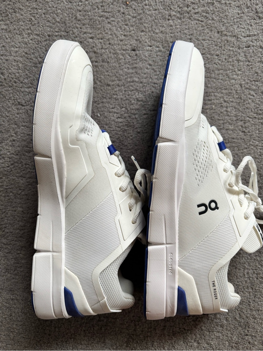 On Running Cloud Women’s White Athletic Shoes with Purple Accents